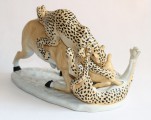 Porcelain bull and leopards