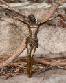A wall mount bronze figurine of a Jesus