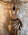 A wall mount bronze figurine of a Jesus