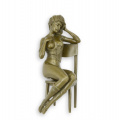 Statue of a naked woman on chair made of bronze 3