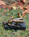 Erotic bronze statuette of a naked woman and stretching