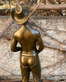 Erotic bronze figurine of a naked man with cowboy outfit