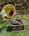 A BRASS MOUNTED SQUARE GRAMOPHONE GOLD