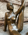 Erotic bronze statuette of a naked woman and stretching 2