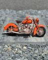Tin model of a red motorcycle
