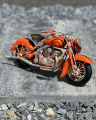 Tin model of a red motorcycle