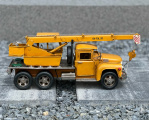 Tin metal yellow mobile crane