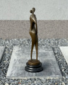 A large bronze sculpture of a couple in love - modern art