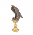 A large bronze eagle statue on a pedestal