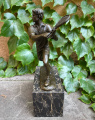 Bronze statue of tennis player