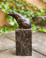 a Bronze bear figurine