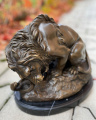 Lion and snake statue