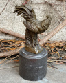Sculpture of a rooster made of bronze