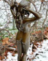 Large sculpture of a naked girl made of bronze