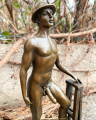 Erotic bronze figurine of a naked man with hat