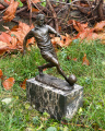 Bronze soccer player figurine