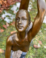 Statue of a gymnast with hoop made of bronze