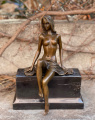 Erotic bronze statue of a half-naked girl