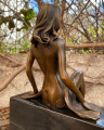 Erotic bronze statue of a half-naked girl
