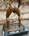 Figurine of sexy naked man made of a real bronze