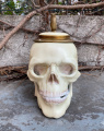 Porcelain skull stein with bronze decoration