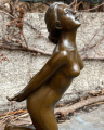 Erotic statue of a tied nude woman made of bronze