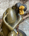 Erotic bronze statuette of a woman and a penis