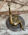 Erotic bronze statuette of a lying naked girl