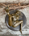 Erotic bronze statuette of a lying naked girl