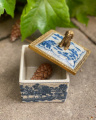 Porcelain and bronze casket with a dog