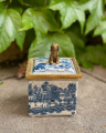 Porcelain and bronze casket with a dog